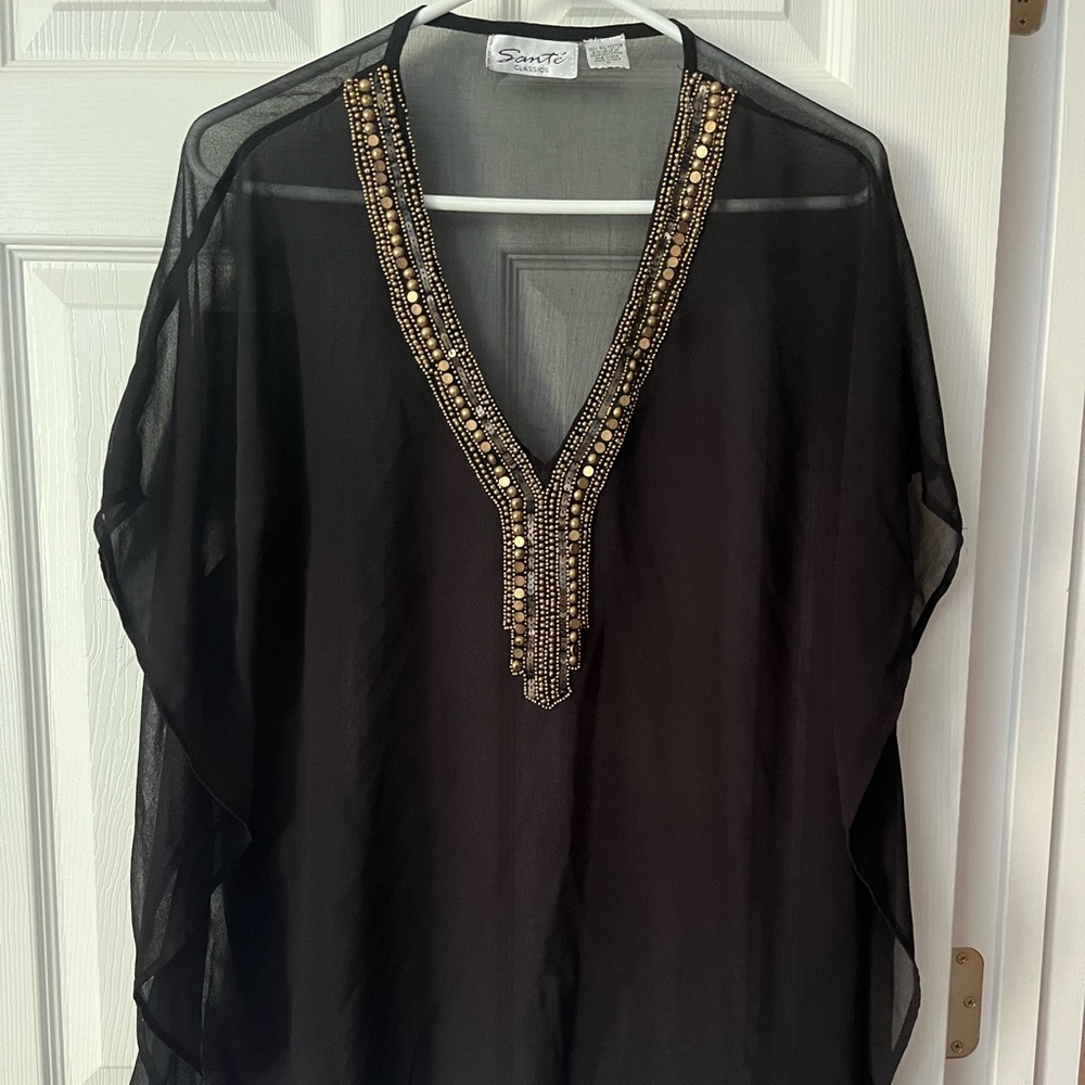 Medium. Sheer, great as a cover-up or night out with a tank underneath.